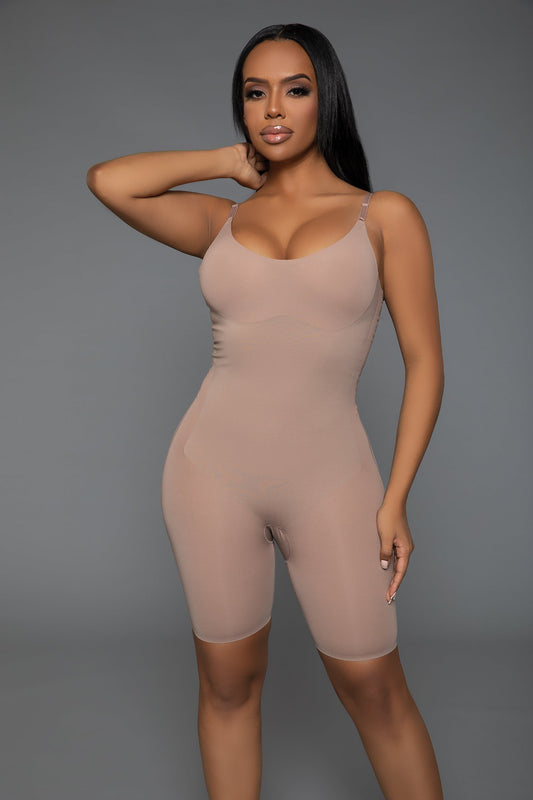 Elevate your confidence with our Seamless Full Body Shaper, designed to provide maximum support and a smooth silhouette under any outfit. Crafted from high-quality, breathable fabric, this body shaper features adjustable straps for a customized fit and targeted compression zones that shape and enhance your natural curves. Adjustable straps Lifting bust and bottom design Tummy control Seamless smoothing design Open crotch Handwash only, line dry. Do not tumble dry/bleach/iron.