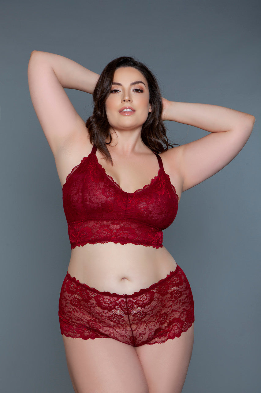 The Cindy bralette and shorty set is a charming and sensual ensemble, designed for those who love to blend the allure of lace with the beauty of floral patterns. This exquisite set features a cropped bralette top and shorty crafted from delicate floral lace, offering a sheer, lightweight feel that's both breathable and enticing. V neckline Racerback Cropped lightly lined top Sheer bottom Scalloped shorts Thong not included