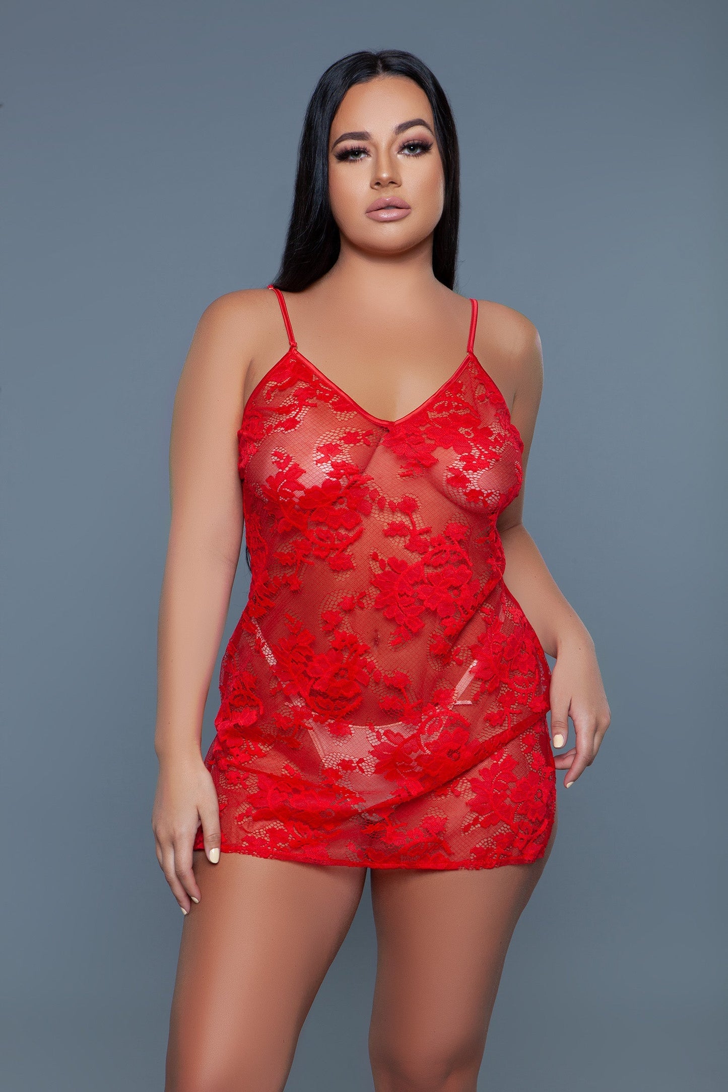 Luxurious floral lace chemise, designed to highlight the delicate beauty of lace with a floral pattern. This chemise features an elegant, body-skimming silhouette that gracefully outlines the wearer's figure. V neckline Adjustable spaghetti straps Back satin button keyhole closure Side slits Thong not included Machine wash warm with similar colors on delicate cycle. Do not bleach/tumble dry/iron/dry clean. Be Wicked box packaging
