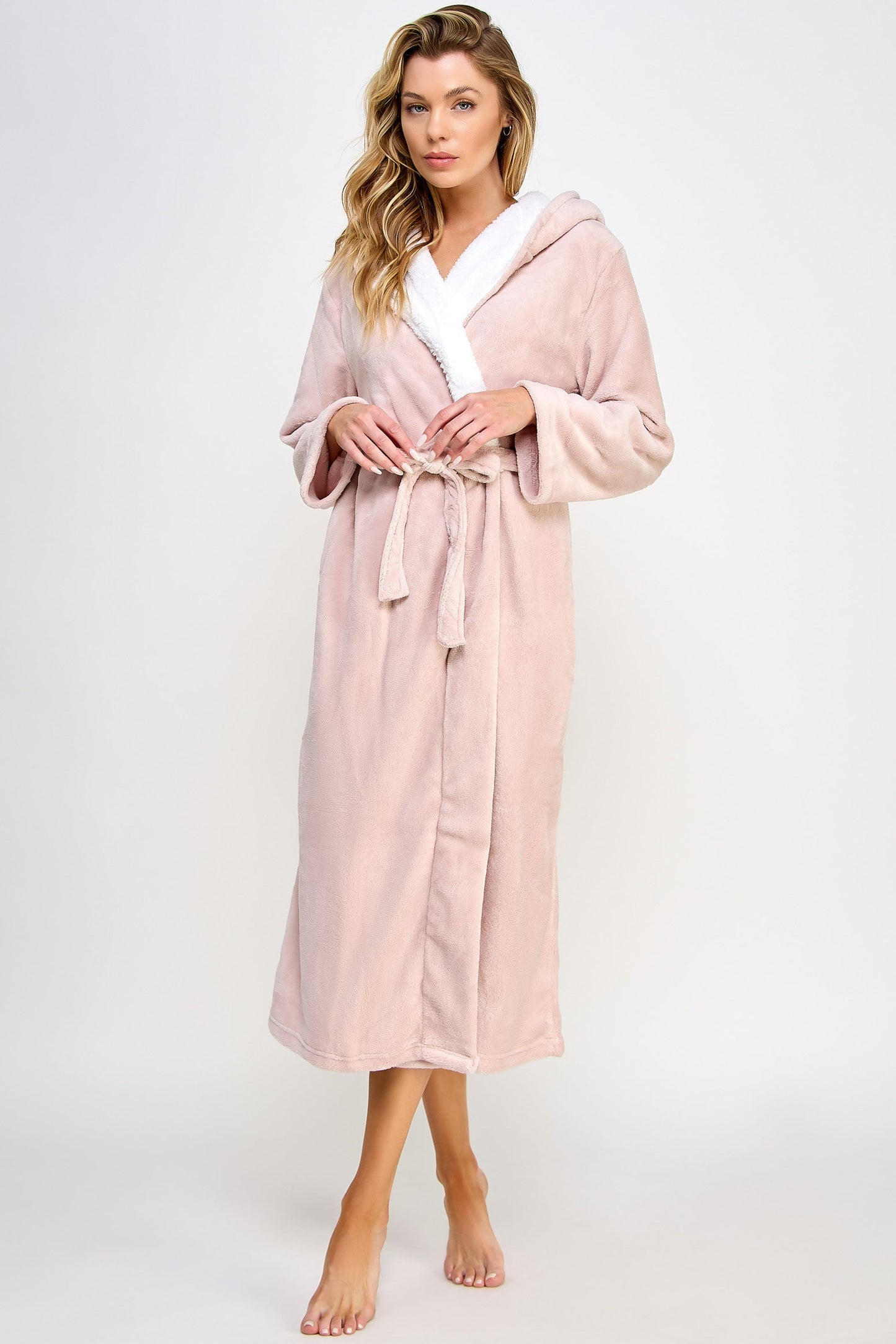 Experience the epitome of comfort with this plush fleece robe, designed to envelop you in warmth from head to toe. Its ultra-soft sherpa lining promises a cozy embrace, making it the perfect companion for chilly mornings or relaxing evenings at home. Color block Hooded Long sleeves Adjustable front tie belt Long fitting