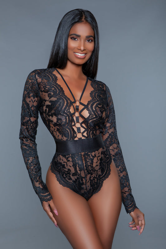 Ramona bodysuit is a sultry combination of delicate lace with a twist of metal rings and a cage design. Plunging metal ring and gage design Scalloped trim Long sleeves Cut out open back Elastic waist