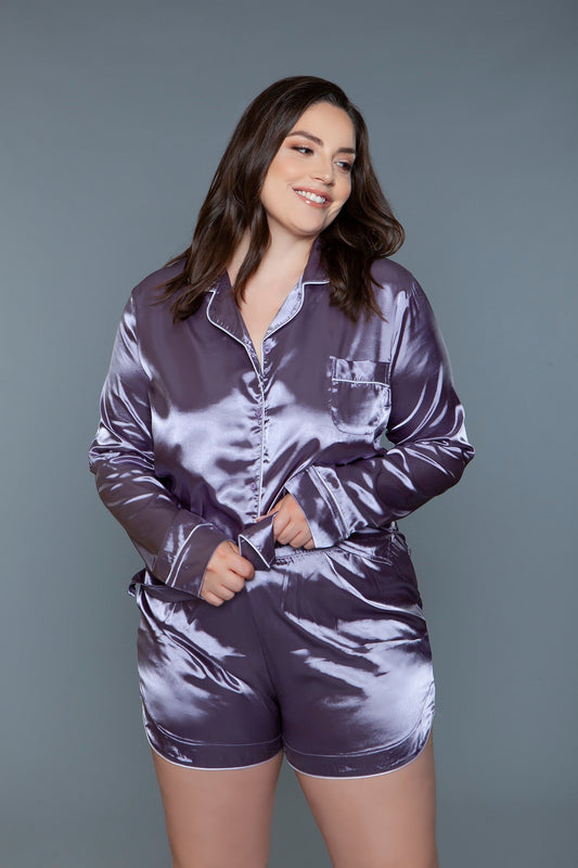 Two piece satin pajama set. Long sleeves top and shorts with silver piping.