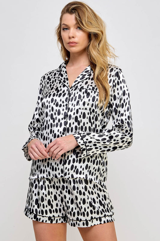 Comfy Dalmy PJ Set features a long sleeve top and shorts. Knot collar Long sleeves Button up closure Elastic waist short Decorative piping