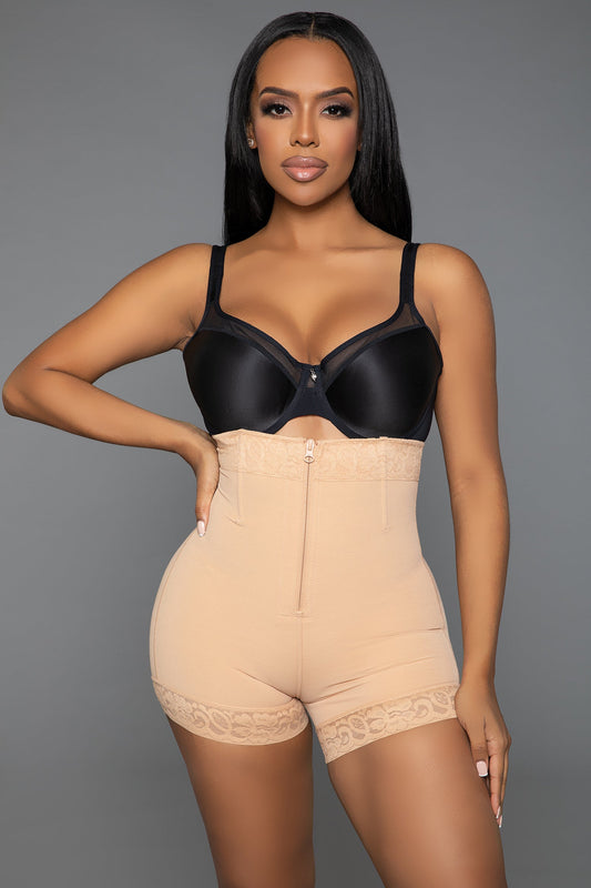 Achieve your desired silhouette with our Hug Me Close Bodyshaper Shorts. Featuring a convenient front zipper, these shorts provide easy wear and a secure fit. The tummy control design ensures a smooth and toned midsection, while the butt lifting feature enhances your natural curves for a flattering look. The lace hem adds a touch of elegance and femininity, making these shorts as stylish as they are functional. Front hook and eye and zipper closure Tummy control technology But lifting design Stretchy lace 