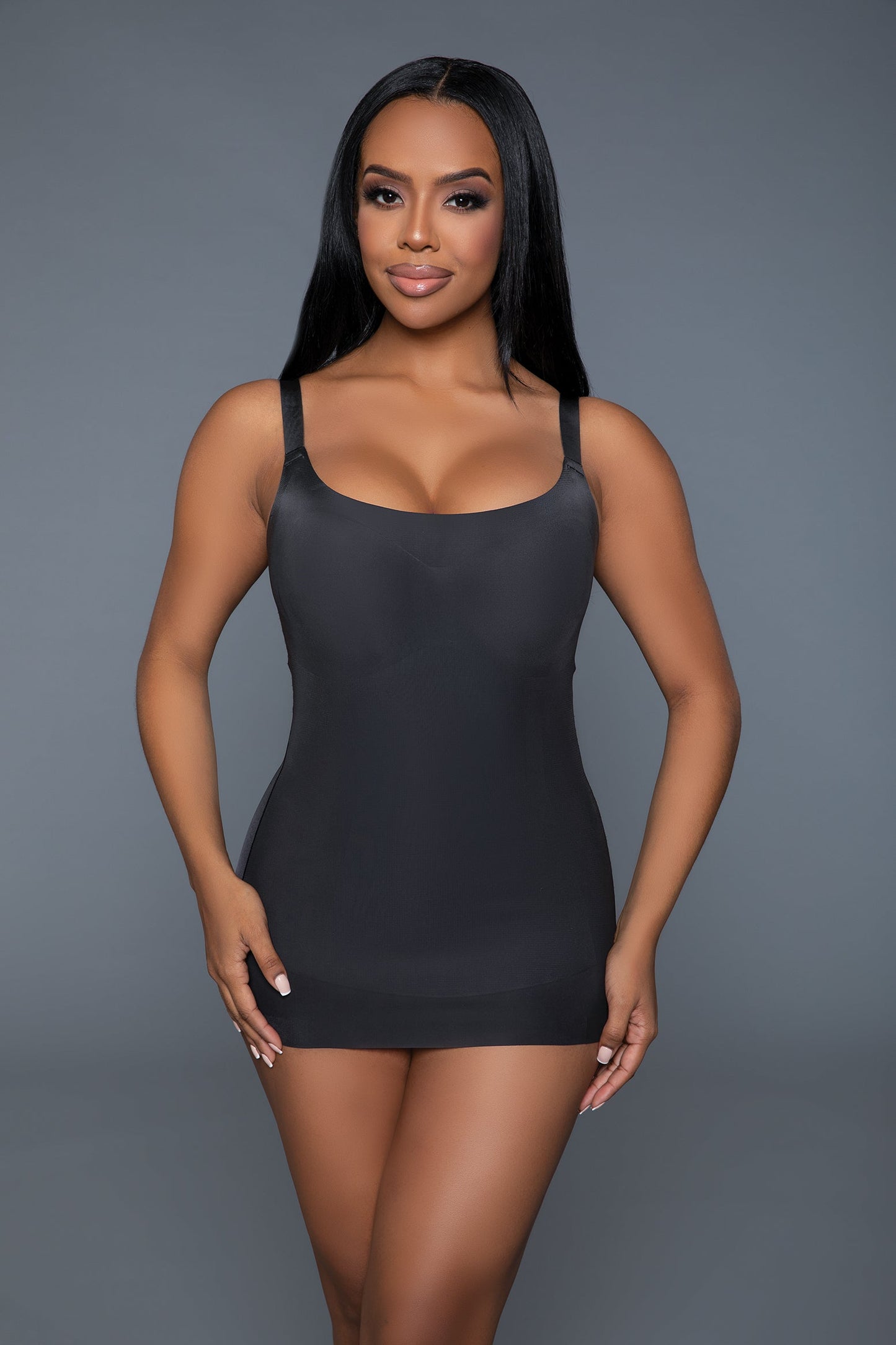 Achieve a flawless silhouette with the Stay Sexy Shaper Top, designed to enhance your natural curves while providing maximum comfort and support. This versatile shapewear features a removable foam cup to accommodate your preferred level of coverage and support. The tummy control panel smooths and flattens your midsection, while the innovative bust and butt lift design accentuates your figure, giving you a confident and sculpted look. Seamless round neckline Adjustable straps Removable one-piece foam cup bu