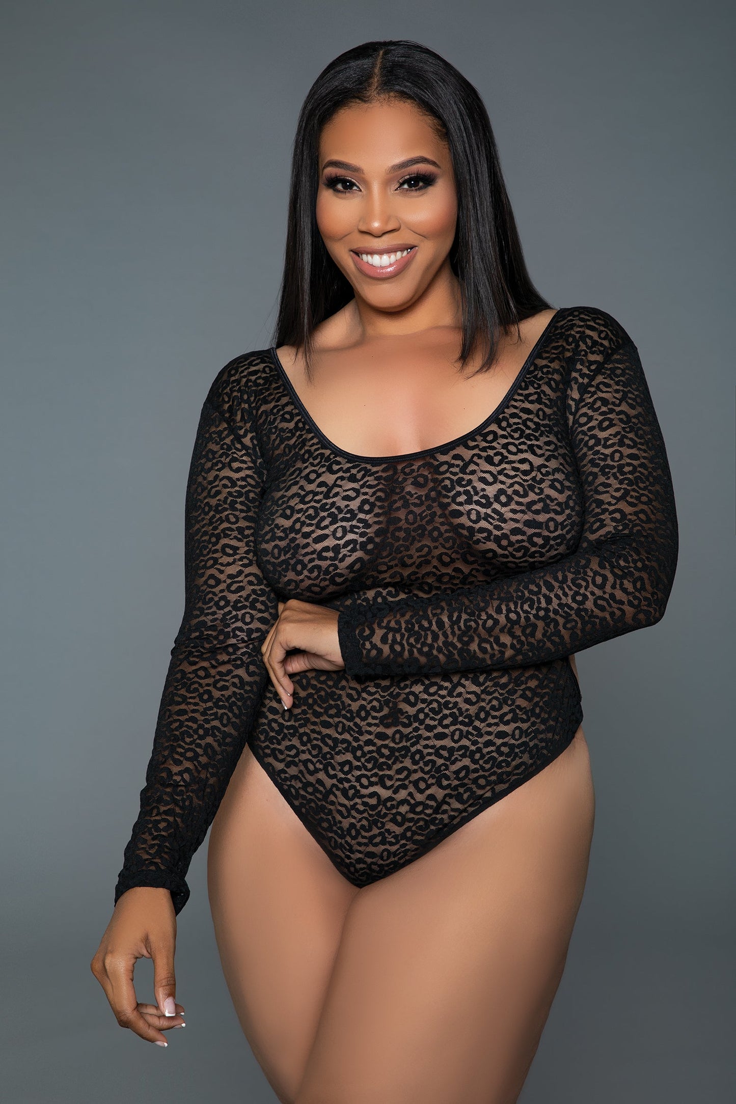 Step into bold sophistication with this leopard pattern The Wildest Bodystocking Bodysuit. Designed with long sleeves for a sleek and elegant look, this piece boasts an alluring open-back detail that adds a touch of drama. Perfectly blending comfort and style, it features a figure-hugging silhouette, making it ideal for evening outings, stylish layering, or a romantic date. Round neckline Long sleeves Back crisscross detail Open lower back Thong-style bottom Thong and pasties not included Hand Wash Warm Wa