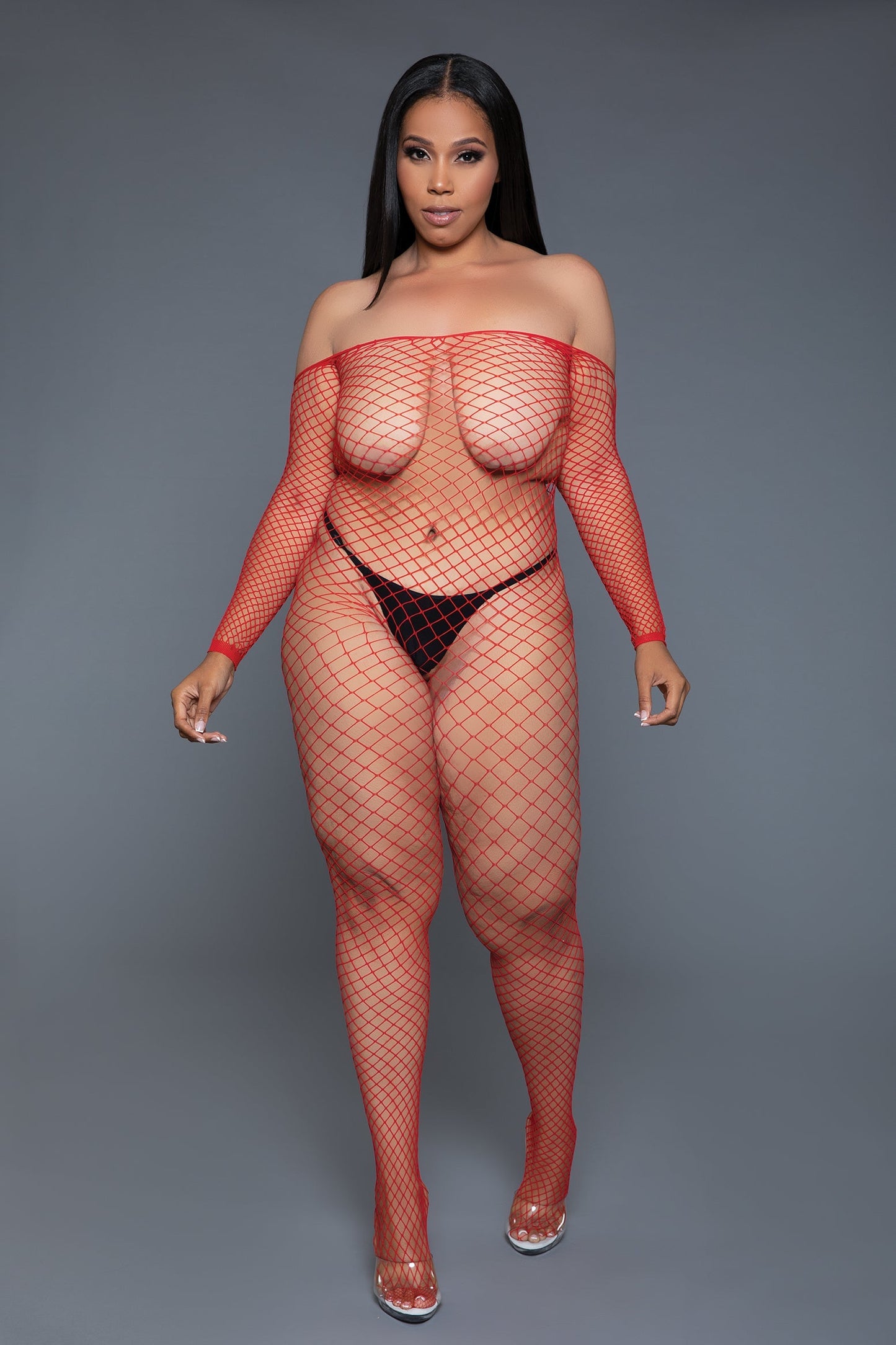 Unleash your daring side with our Catch Me Bodystocking, a statement piece designed for those who embrace bold fashion choices. This bodystocking combines the seductive appeal of fishnet with an off-shoulder cut, creating an attractive look that's as audacious as sensual. Long sleeves Off shoulder Fishnet from toe to shoulders Thong and pasties not included