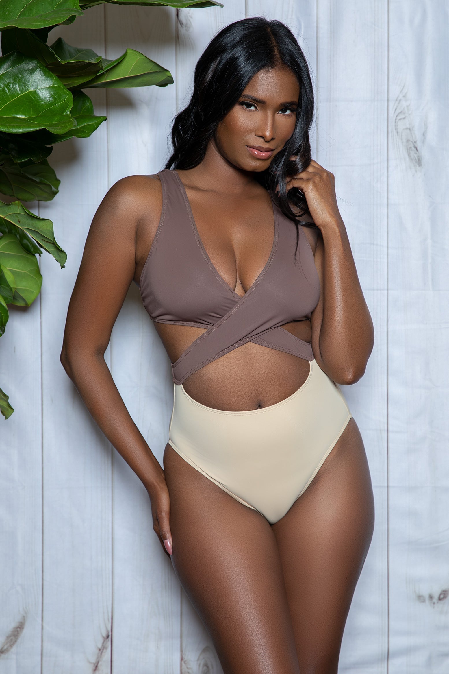 Mia Color Block One Piece Swimsuit Plunging v-neckline Padded top Features a sexy front and back crisscross detail on the waist High Waist full coverage bottom Hand wash in cold water, dry in shade. Do not bleach/iron/dry clean. Be Wicked Swimwear Polybag Packaging