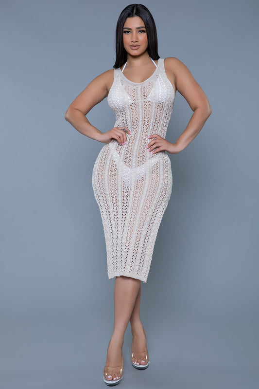 Discover effortless elegance with our Crochet Midi Dress Cover-Up, designed to be the perfect addition to your summer wardrobe. Crafted from high-quality, breathable fabric, this dress is as comfortable as stylish. The intricate crochet pattern adds a touch of bohemian charm, while the midi length offers a sophisticated silhouette. Crochet pattern Sleeveless Round neckline Deep u back Side slit Machine wash cold on delicate cycle. Line dry in shade, cool iron if needed. Do not bleach/tumble dry/dry clean. 