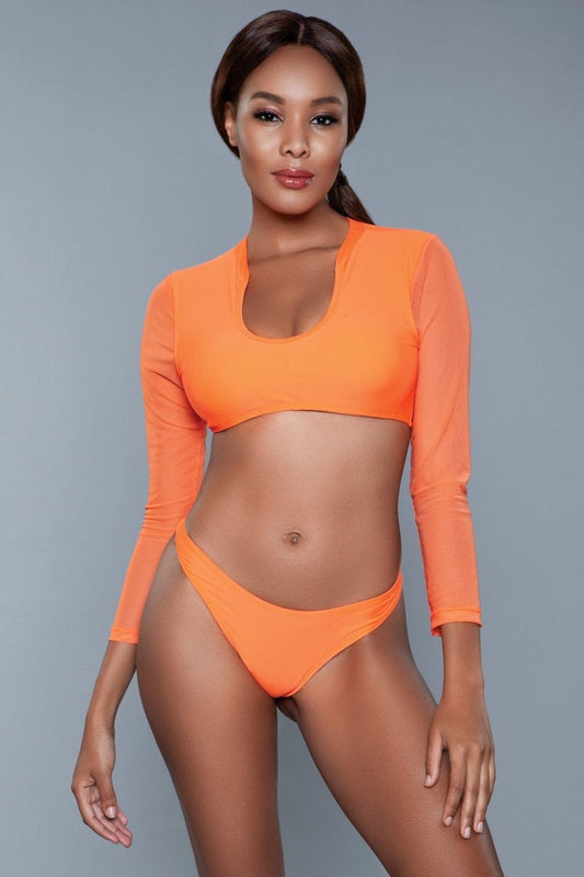 A fusion of functionality and flair designed for sun seekers who desire a touch of sophistication in their swimwear. This unique ensemble pairs a classic bikini top with a long-sleeved mesh overlay and a Brazilian thong bottom. Perfect for those who wish to embrace the sun while keeping their style sleek and modern by the poolside or the beach. Round neckline cropped top Padded Long mesh sleeves Sexy Brazilian thong bottom Hand wash in cold water, dry in shade. Do not iron/bleach/dry clean. Be Wicked Swimw