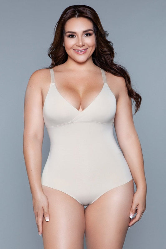Your secret weapon for a sleek, seamless silhouette under any outfit. Designed for those who desire both support and a smooth contour, this bodysuit is crafted with cutting-edge fabric technology to sculpt and shape your figure, providing an invisible layer of confidence. Seamless Surplice V neckline Adjustable straps Snap-on closure panty Machine washable. Do not bleach/iron/dry clean. Be Wicked box packaging, dimensions (in): 10x7x1 92% Polyamide 8% Elastane