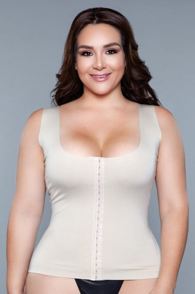 Elevate your confidence and embrace a seamless, sculpted look with the Miraculous Top front hook and eye closure shapewear. Redefine your wardrobe essentials with a piece that offers the ultimate blend of convenience, comfort, and style. Seamless Wide shoulder straps Low round neckline Front hook and eye closure