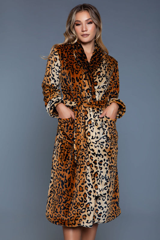Indulge in the ultimate blend of comfort and style with our Luxurious Leopard Print Plush Robe. This robe exudes elegance while keeping you warm and cozy this holiday season, making it perfect for lounging in sophisticated fashion. Crafted from ultra-soft plush fabric, it offers both opulence and warmth. This animal print robe is a must-add to your loungewear collection. Comfy easy wear Long sleeves Below the knee length Front pockets Front tie belt