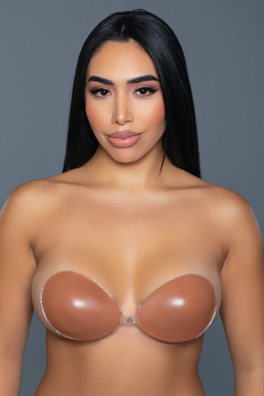 A must-have silicone strapless bra, this bra is seamless bringing comfort. Great to wear with those challenging outfits that require no bra. Seamless Strapless No back coverage Adhesive back Handwash with mild soap in cold water, air dry. Do not use powder/moisturizer/oils/fragrances near the bust area. Do not apply over broken, damaged, or sun-burned skin, if you have trouble removing the pastie, take a hot shower or soak in the bath. 100% Silicone