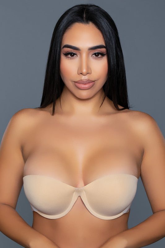 Experience the perfect blend of invisible support and everyday comfort. Designed for those who seek a seamless look under their favorite outfits without compromising on the soft feel of fabric, this strapless bra offers a revolutionary approach to lingerie. Clear back strap included Adhesive sides provide support Strapless Fabric front Handwash with mild soap in cold water, air dry. Do not use powder/moisturizer/oils/fragrances near the bust area. Do not apply over broken, damaged, or sun-burned skin, if y