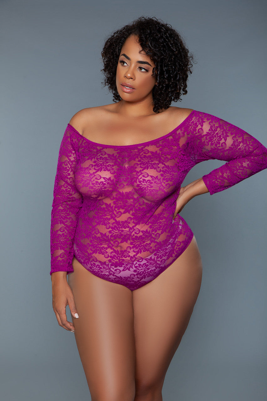 An off-shoulder floral lace bodysuit is a captivating piece of clothing that combines the allure of lace with a flattering off-shoulder design. This bodysuit features a neckline that elegantly exposes the shoulders, creating a sensual and feminine silhouette. Off shoulder neckline Long sleeves Snap-on panty closure Thong not included