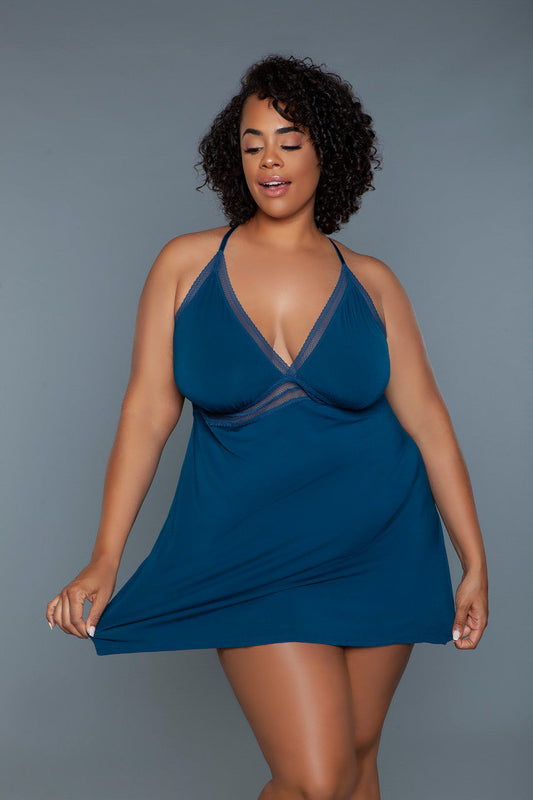 The Hailee babydoll is a cozy yet seductive piece of lingerie that blends the softness and comfort of flowy knit fabric that drapes over the body with the delicate charm of lace accents. Plunging v neckline Adjustable crisscross spaghetti straps Alluring lace accents Breathable knit fabric