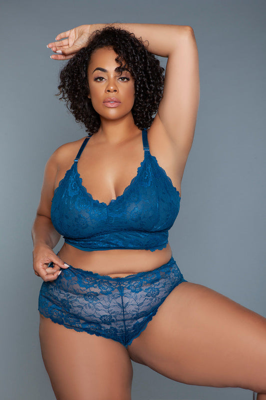 The Cindy bralette and shorty set is a charming and sensual ensemble, designed for those who love to blend the allure of lace with the beauty of floral patterns. This exquisite set features a cropped bralette top and shorty crafted from delicate floral lace, offering a sheer, lightweight feel that's both breathable and enticing. V neckline Racerback Cropped lightly lined top Sheer bottom Scalloped shorts Thong not included
