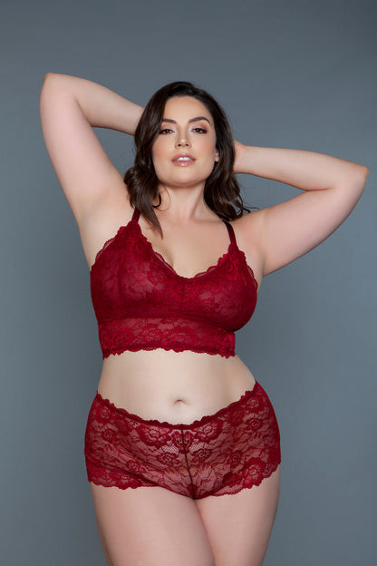 The Cindy bralette and shorty set is a charming and sensual ensemble, designed for those who love to blend the allure of lace with the beauty of floral patterns. This exquisite set features a cropped bralette top and shorty crafted from delicate floral lace, offering a sheer, lightweight feel that's both breathable and enticing. V neckline Racerback Cropped lightly lined top Sheer bottom Scalloped shorts Thong not included