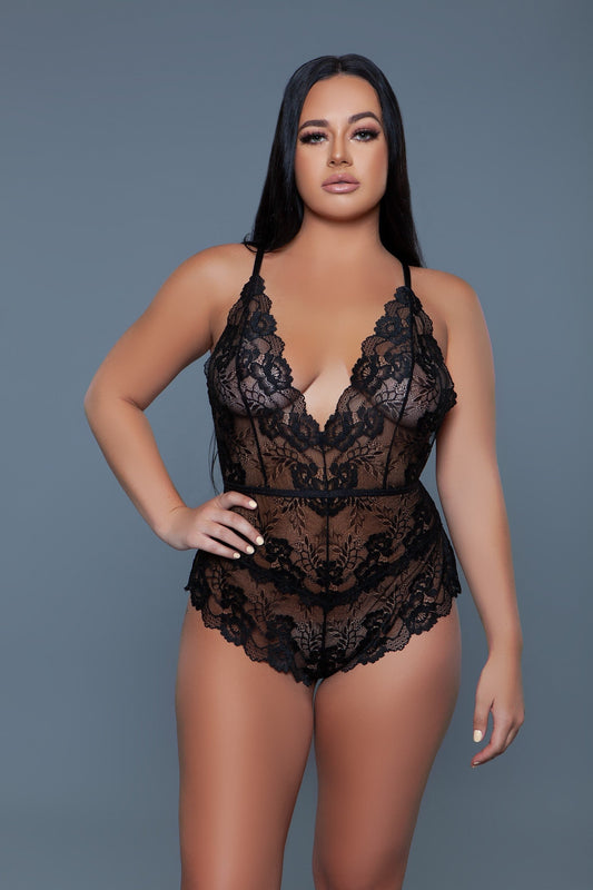 Elegant lace bodysuit, designed to showcase the intricate beauty and delicate craftsmanship of floral lace fabric. It's lace brings a fine quality, with detailed floral patterns that offer a glimpse of the skin beneath, creating a balance between elegance and allure. Plunging neckline Adjustable crisscross spaghetti straps Lower back keyhole design Scalloped hem Side slits Cheeky bottom Machine wash warm with like colors on delicate cycle. Do not bleach/tumble dry/iron/dry clean. Be Wicked box packaging