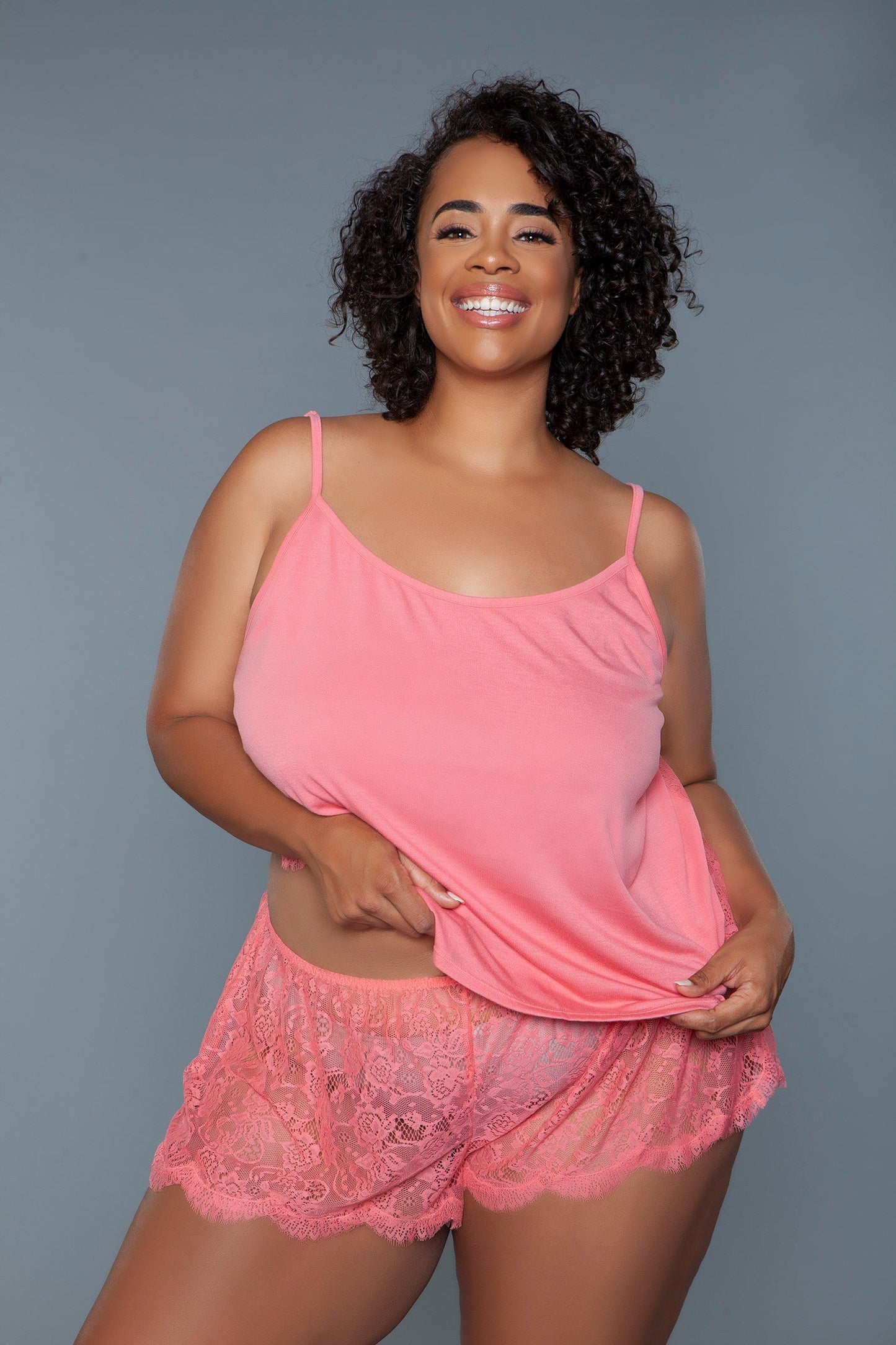 Peyton cami and shorts set is a perfect blend of delicate lace and comfy soft jersey. This set strikes a blend of sensual allure with casual comfort. Round neckline Adjustable spaghetti straps Cami features a front jersey fabric contrasting with back sheer lace detail Side slit matching shorts are made of sheer lace Elastic waist Machine wash cold with similar colors, tumble dry low, low iron. Do not bleach. Be Wicked box packaging with Be Wicked hangtag, hygienic liner, and UPC stickers. Self: 68% Polyest