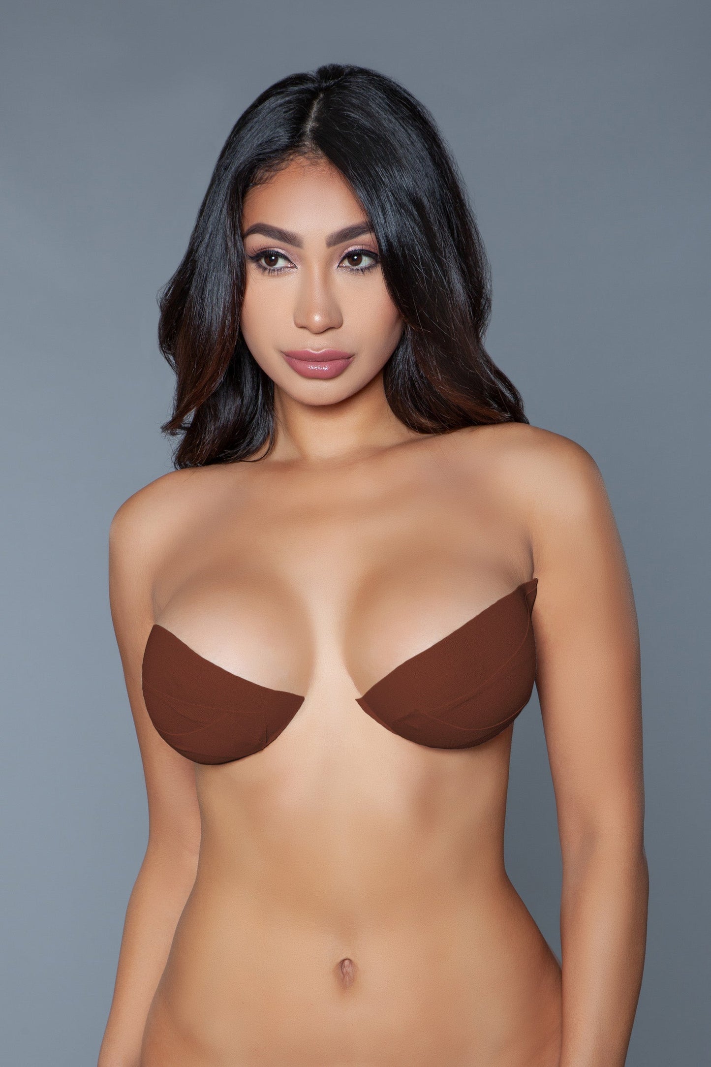 This innovative tape is crafted from a skin-friendly, stretchable material that adheres securely to the skin, allowing you to create the desired shape and cleavage under any outfit. The waterproof feature ensures that it stays in place even in humid conditions or when coming into contact with sweat or water, making it ideal for swimwear, backless, strapless, and low-cut garments. Breathable Self-contained elastic lifting Invisible Super strong