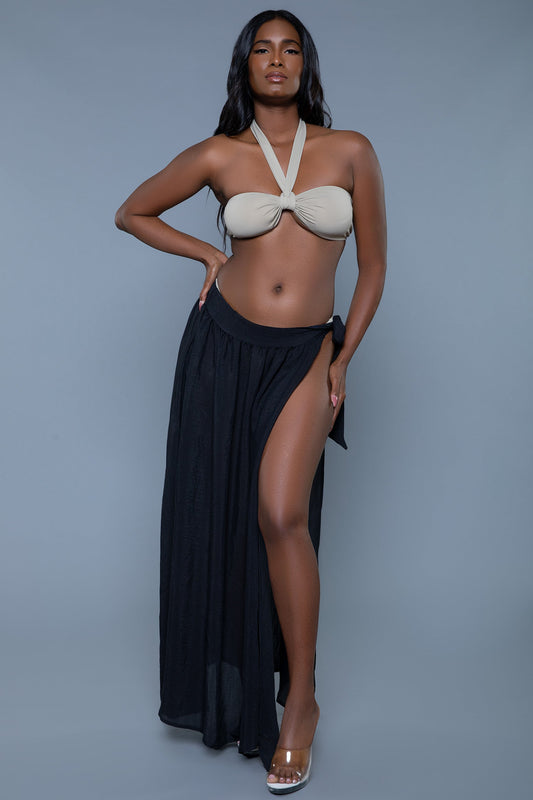 The Claire Gathered Side-Tie Maxi Cover-Up Skirt is a must-have for effortless beachside glamour. Made from lightweight, semi-sheer fabric, this skirt features a gathered design with a side tie, offering an adjustable fit and a touch of elegance. The flowy maxi length and breezy silhouette make it perfect for layering over swimwear. Whether you're lounging by the pool or taking a seaside stroll, the Claire Cover-Up Skirt adds a stylish and sophisticated touch to your summer wardrobe. Waist side tie Flatter